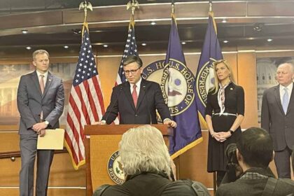 Mike Johnson and party members giving a press conference at the Capitol