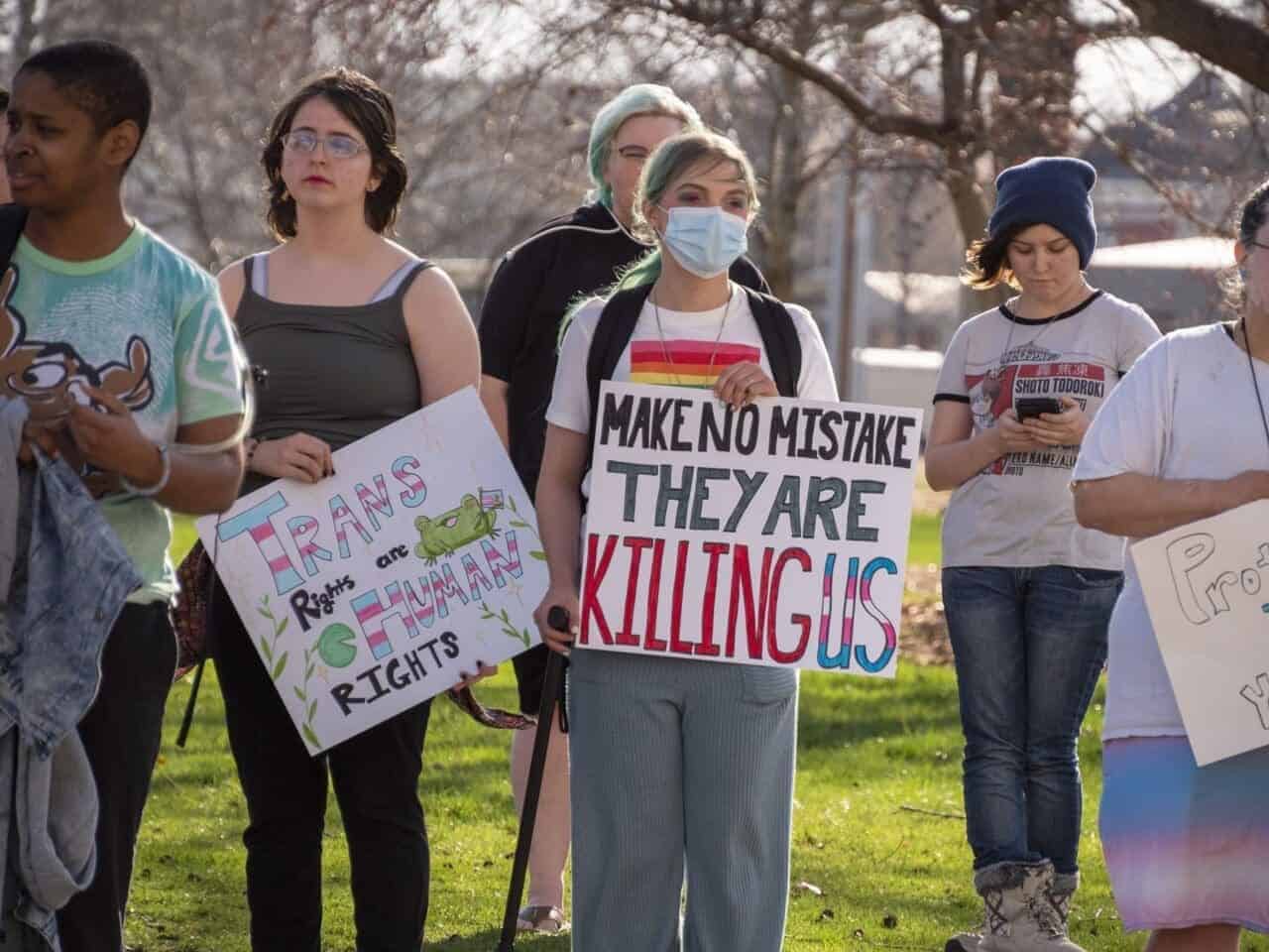 Lgbtq+ youth crisis a trans rights protest outside the kansas statehouse