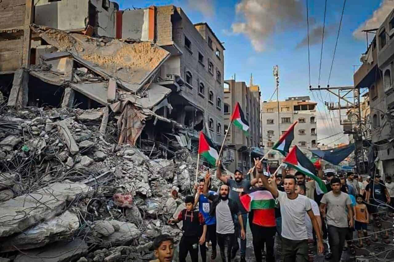 International Criminal Court prosecution of Hamas: Palestinians walk through the destruction In Northern Gaza.
