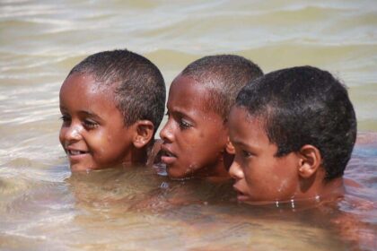 Children play in a canal in Somalia