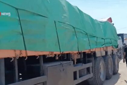 A line of aid trucks blocked trying to get into Gaza