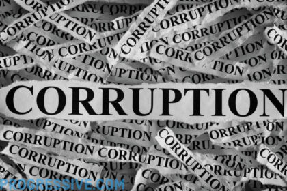 Gop healthcare scheme torn up pieces of paper in a pile with the word corruption printed on them