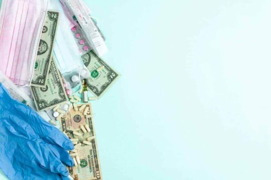 Image of health care items and cash