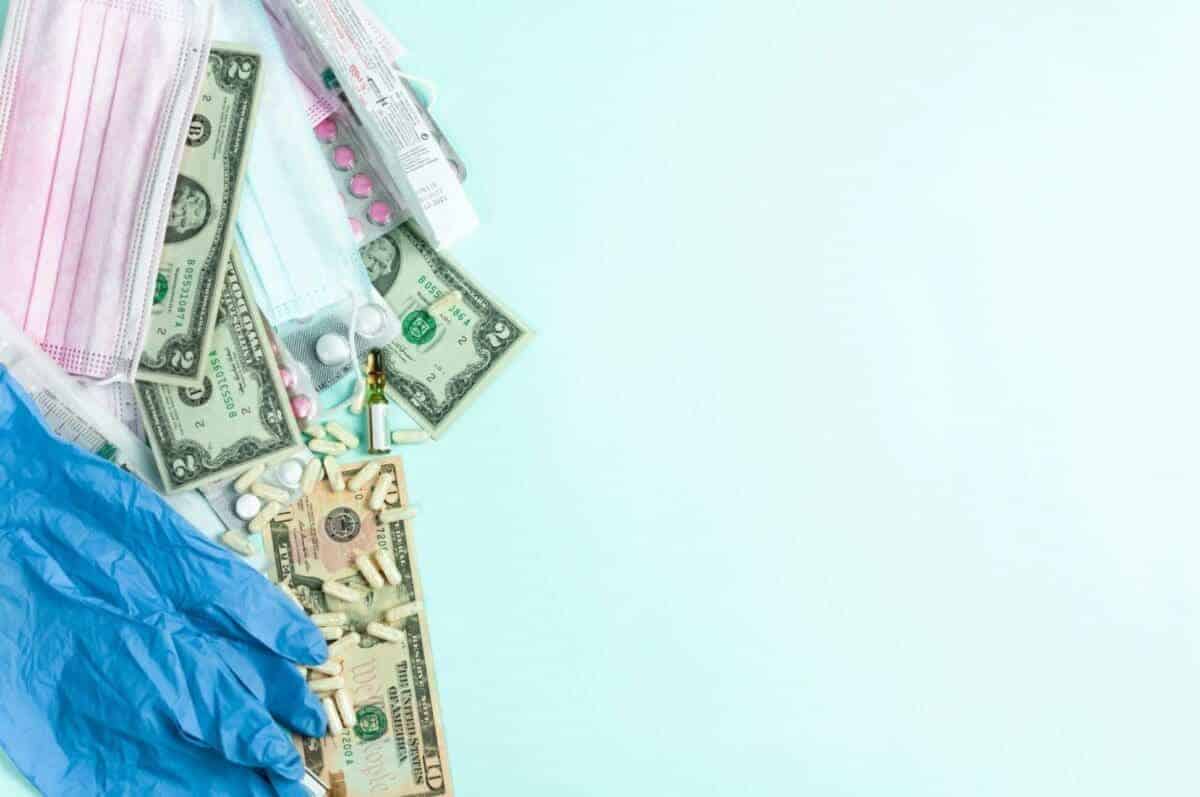 Image of health care items and cash