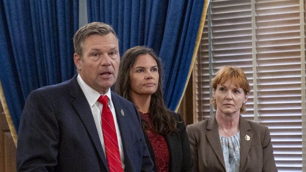 Kansas attorney general kris kobach announces he is suing pfizer during a june 17, 2024, news conference at the statehouse in topeka.