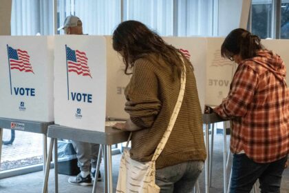 Voters fill out advanced ballots Oct. 25, 2022, at the Shawnee County Election Office in Topeka.
