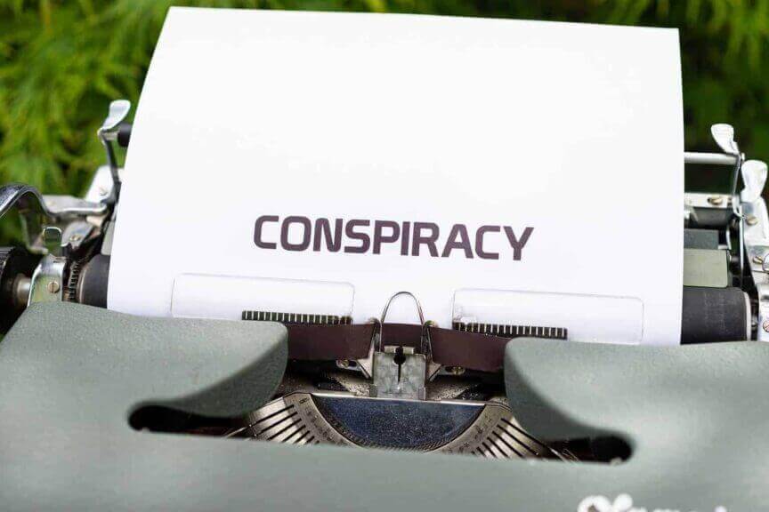 Conspiracy theories A typewriter with a piece of paper in it has CONSPIRACY typed on it.