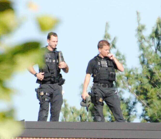 Secret service snipers on a rooftop