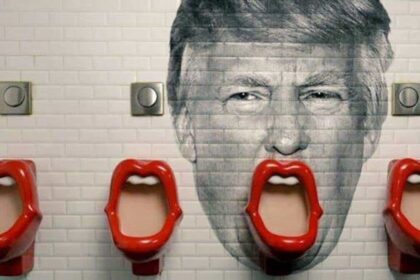 Trump's face painted on the wall behind a urinal so it looks like his mouth