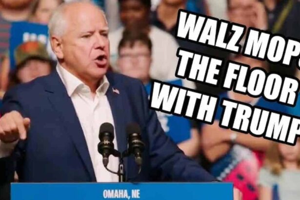 Tim walz on stage at a campaign rally