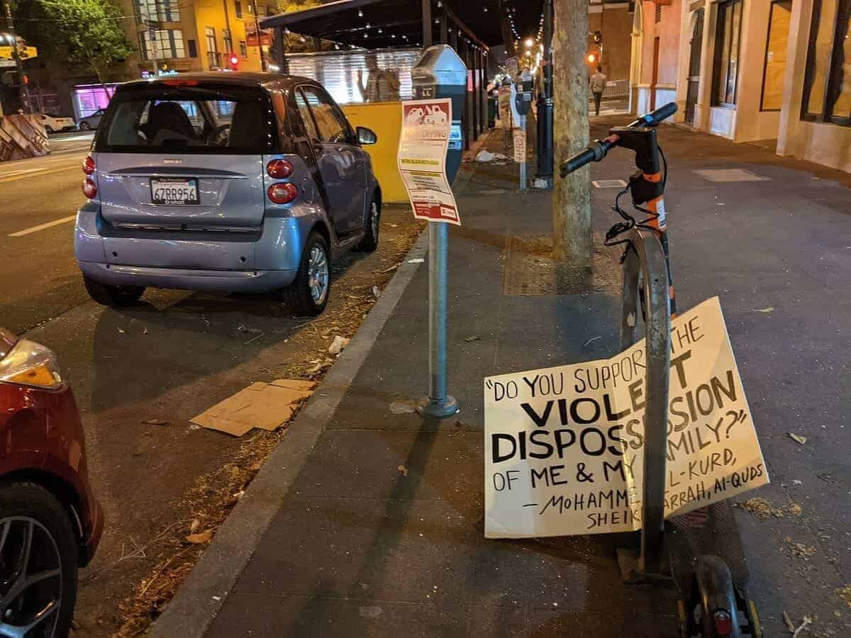 A Pro-Palestinian protest sign discarded on the street in San Francisco