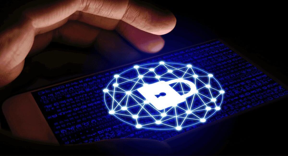 Cybersecurity threats. Hand about to tap a lit up padlock on a touchscreen