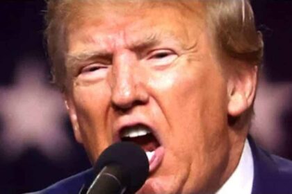 Donald Trump yelling into a microphone