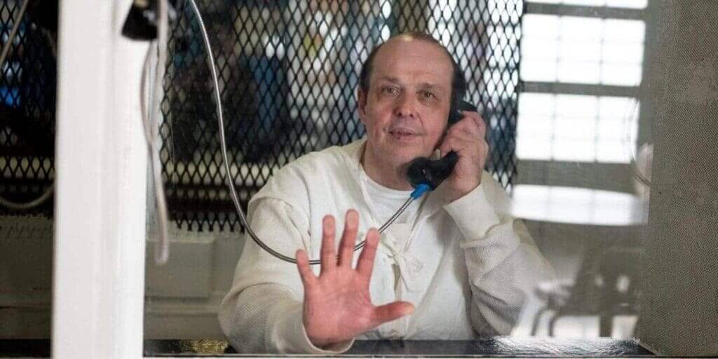 Robert roberson photographed through plexiglass at tdcj polunsky unit in livingston, texas