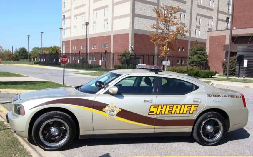 A sheriffs car parked outside a prison in indiana