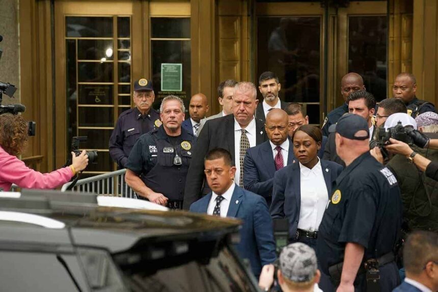 Eric adams' arraignment at the daniel patrick moynihan united states courthouse on september 28, 2024. Eric adams walks to his suv.