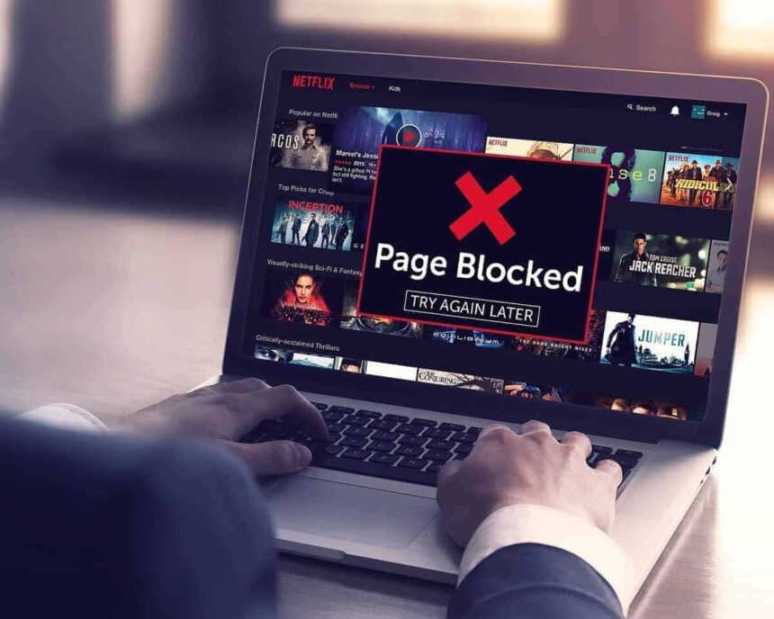 Netflix on a laptop with a page blocked error message