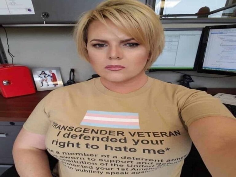 Transgender veteran wearing a shirt that says i fought for your right to hate me project 2025 accomplishments