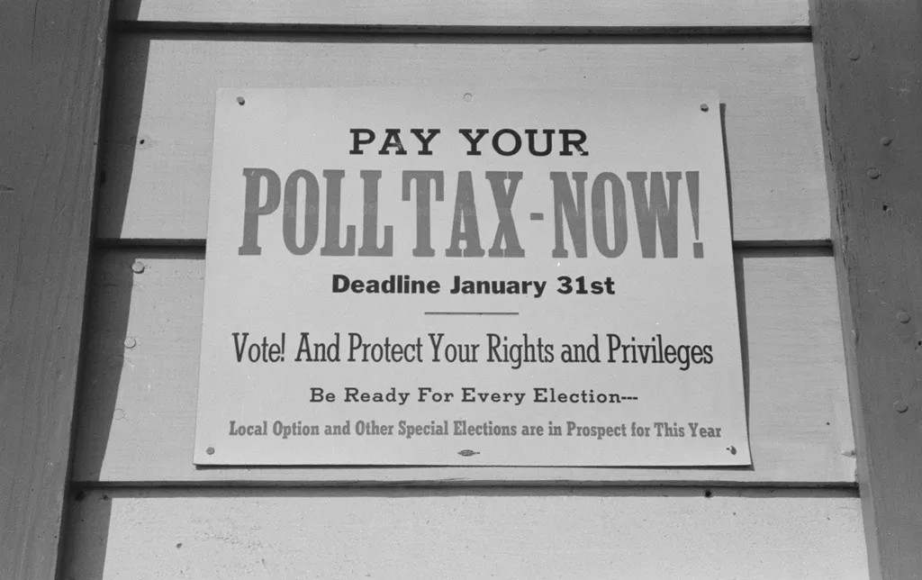 poll tax sign Systemic racism poll tax sign