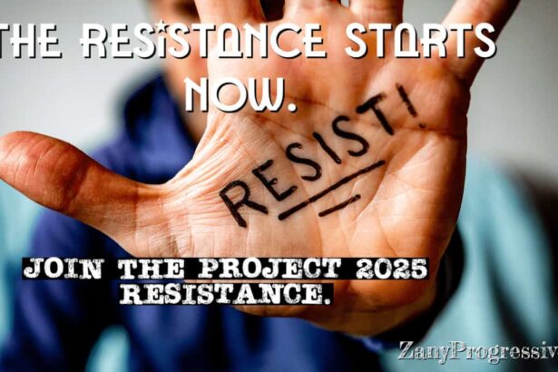 A man with an outstretched hand has resist! Written on it in black marker