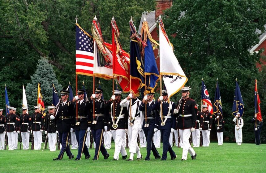 The en:joint service color guard advances the colors during the retirement ceremony of chairman of the joint chiefs of staff gen. Henry h. Shelton, at fort myer, va. , on oct. 2, 2001. Dod photo by helene c. Stikkel.
