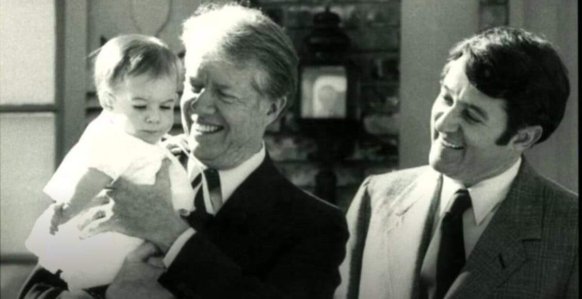 Jimmy carter holding mayor larry wade's daughter, elizabeth in 1979 during a visit to elk city, ok.
