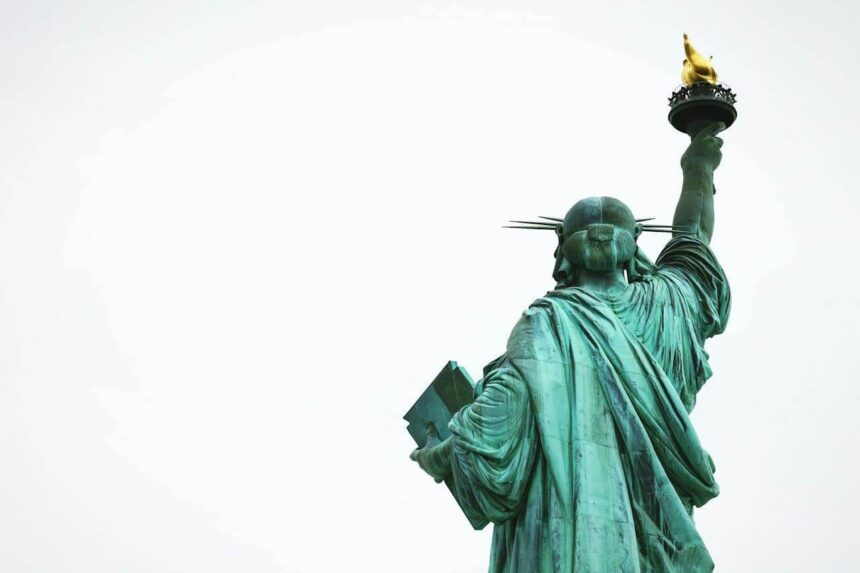 Massachusetts mother back of the statue of liberty