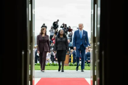 Vice President Kamala Harris, Justice Ketanji Brown-Jackson and President Joe Biden walk into the Capitol together