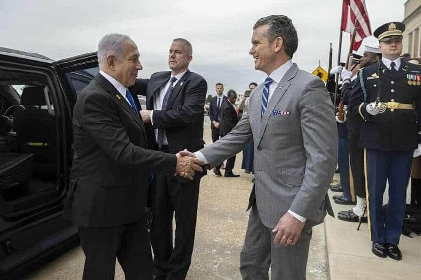 Benjamin Netanyahu being greeted by Secretary of Defense Pete Hegseth