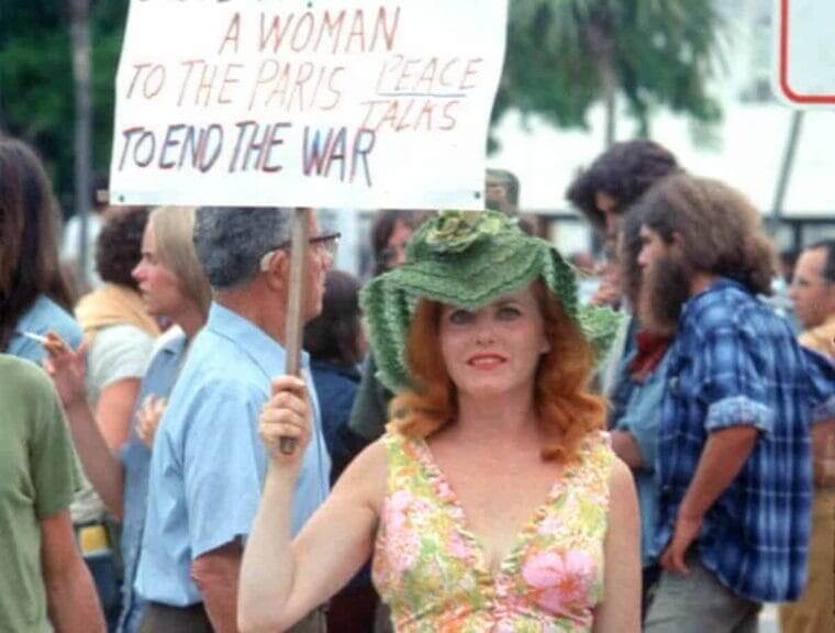A woman protests at the rnc in miami in the 1970s