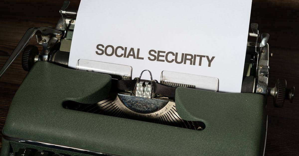 Close-up of a vintage typewriter typing 'social security' on paper, classic concept.