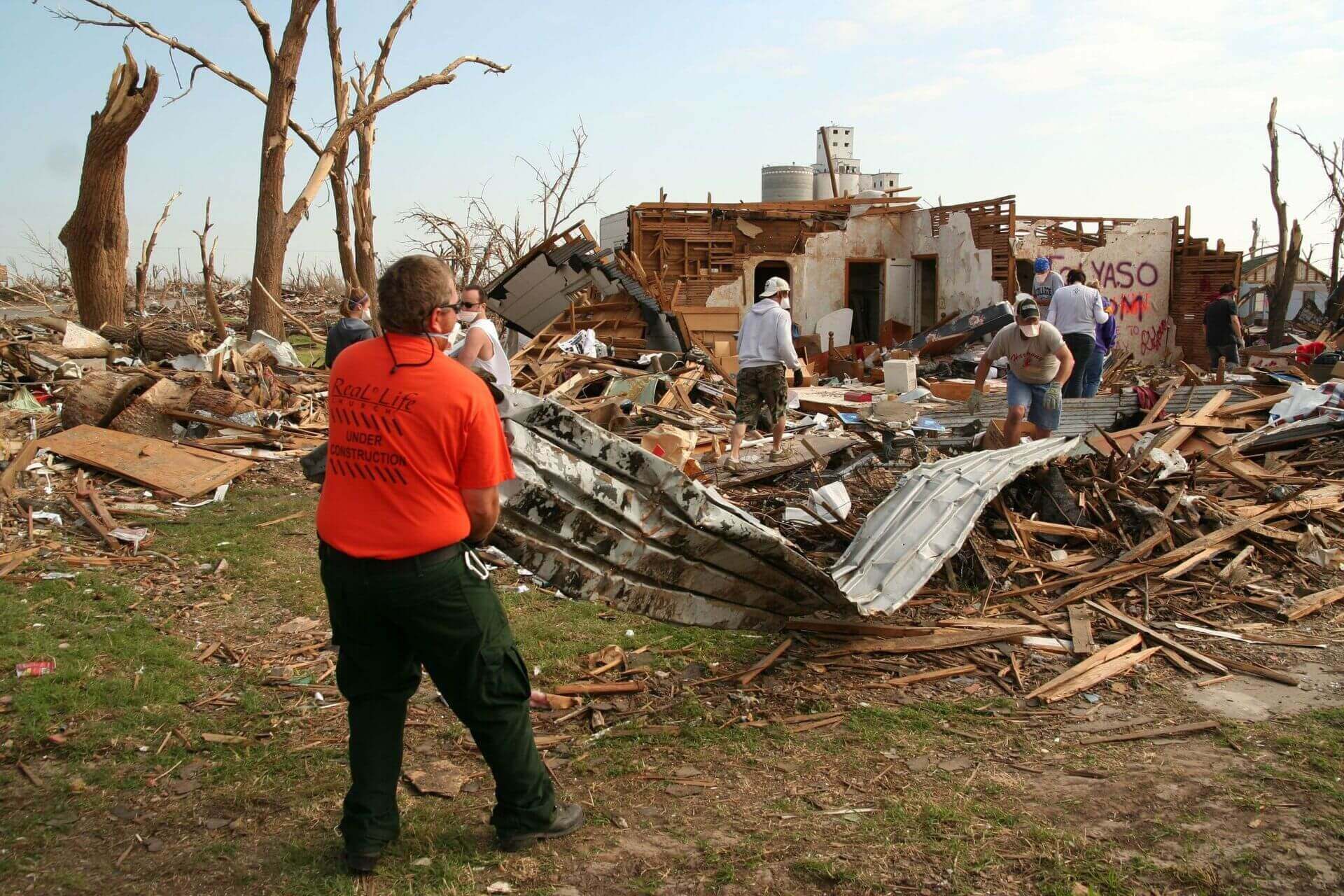 Americorps members clean up after a tornado