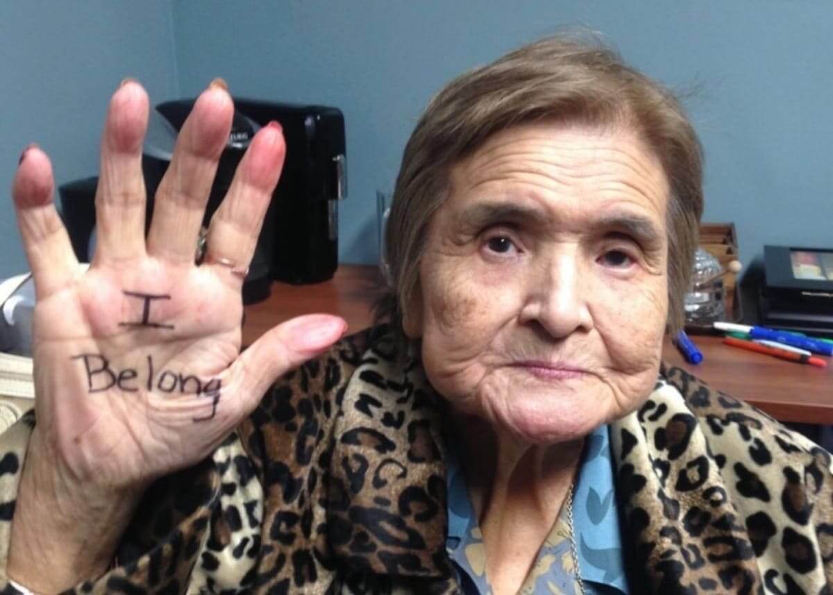 Olive Oshiro with “I Belong” written on her right hand, a message during the Nooksack Indian Tribe's disenrollment of her and 305 of other citizens. The late Oshiro was also a First Nations Shxwhá:y Village citizen.