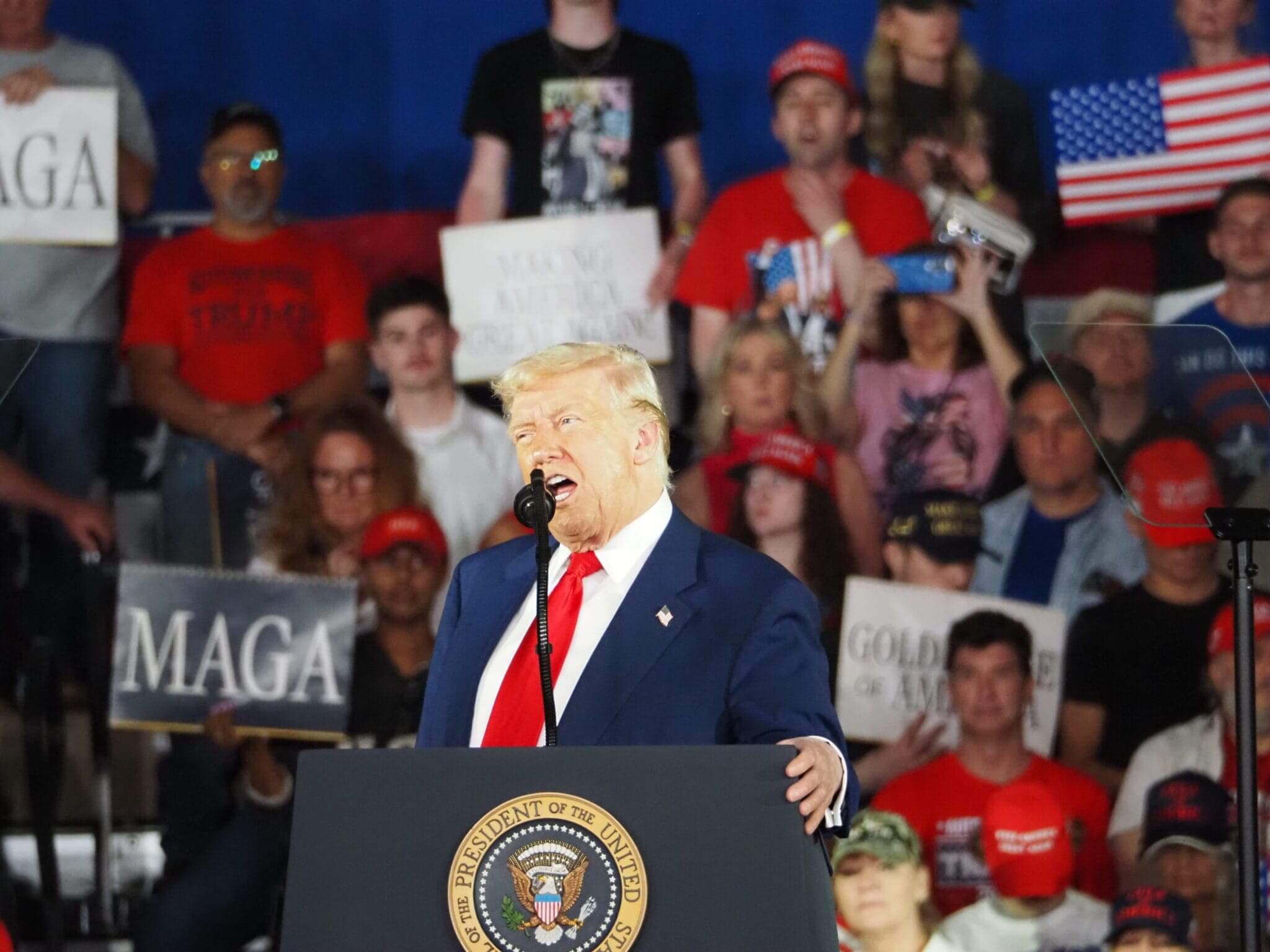 Trump promises influx of auto jobs to michigan while celebrating first 100 days in macomb county