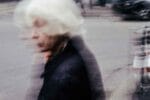 Family member with dementia elderly woman with a blurring effect on the photo
