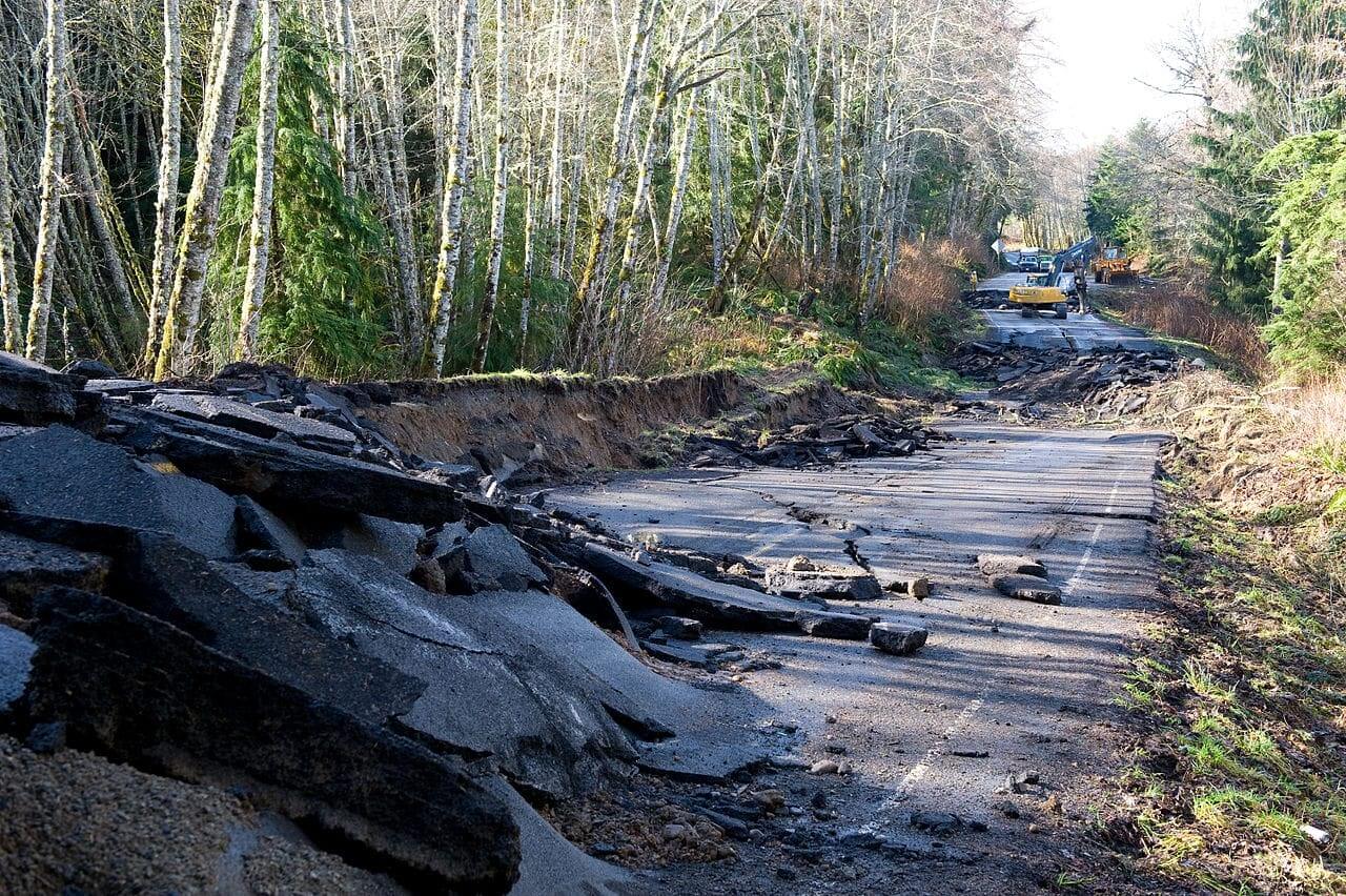 A road damaged by flooding after a storm in washington