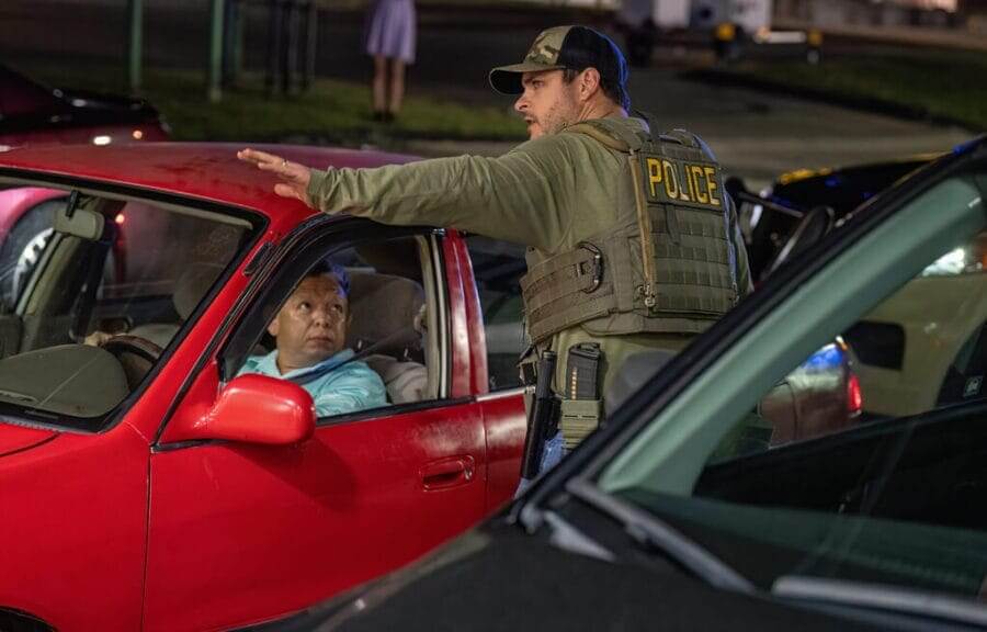 The ice agent directs the driver to pull aside.