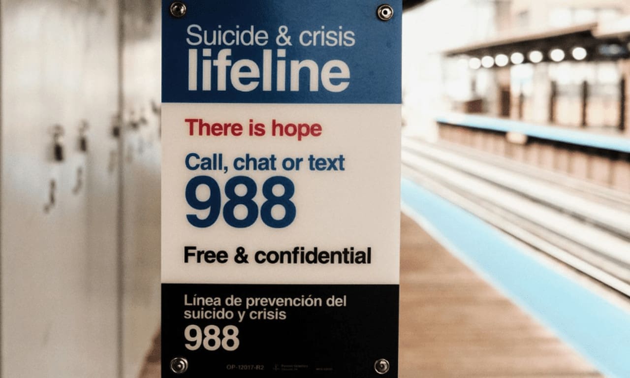 A poster in a school for the youth suicide hotline.