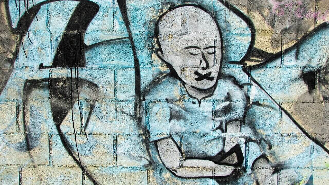 Censorship art in graffiti on an exterior wall