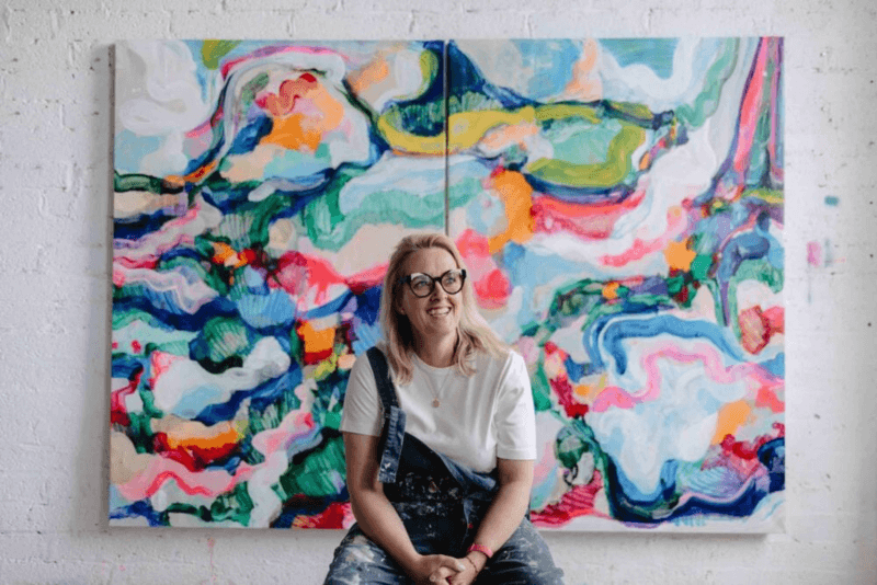 Woman showing off designer bag