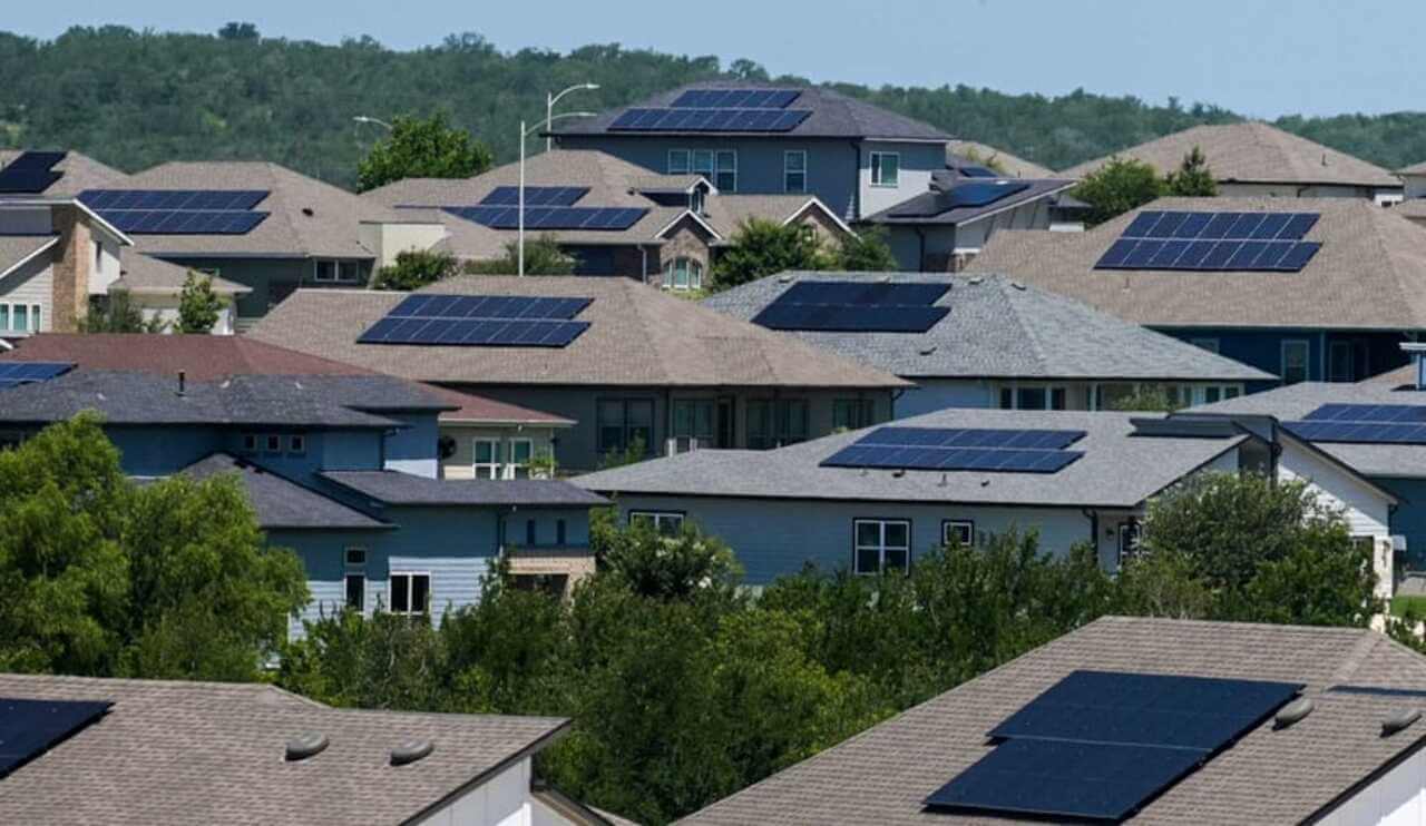 Housing development in texas with solar panels on roof of homes