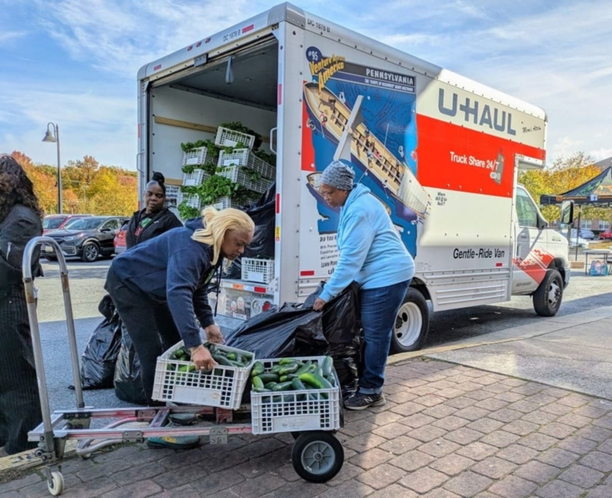 Volunteers delivering food.