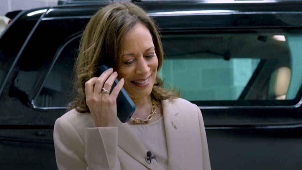 Kamala Harris on the phone with the Obamas