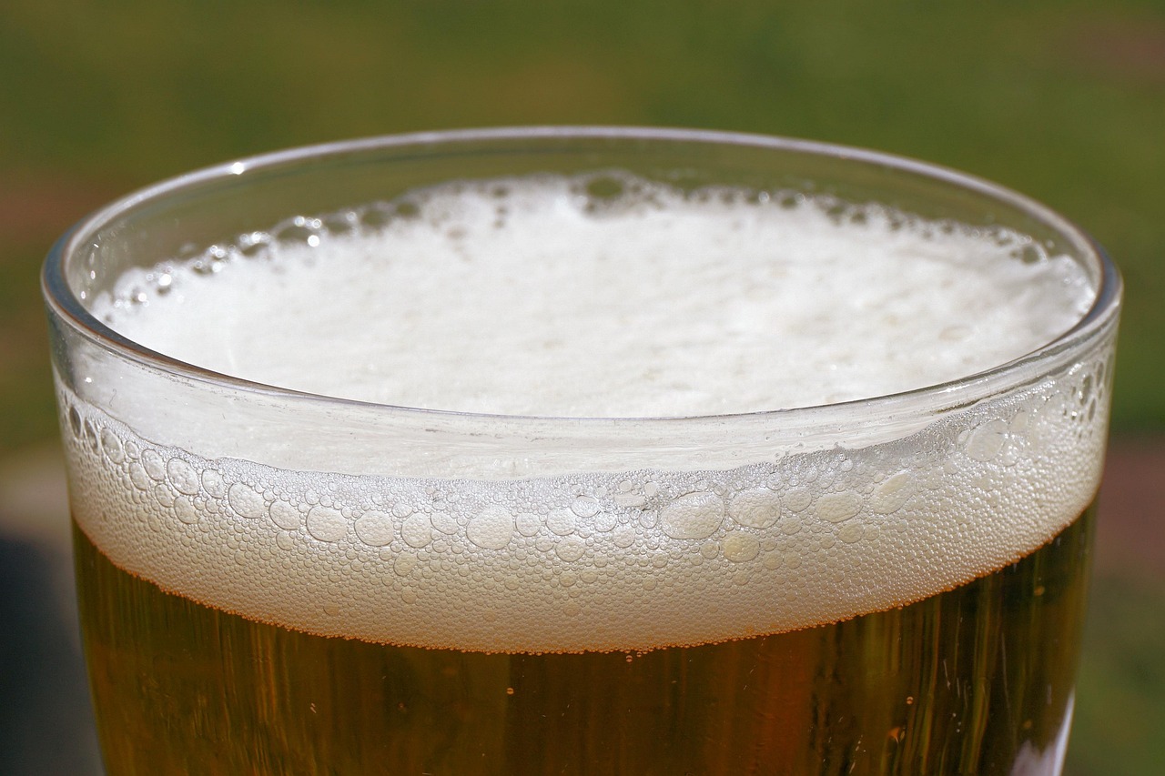 Photo of the froth on top of a glass of beer