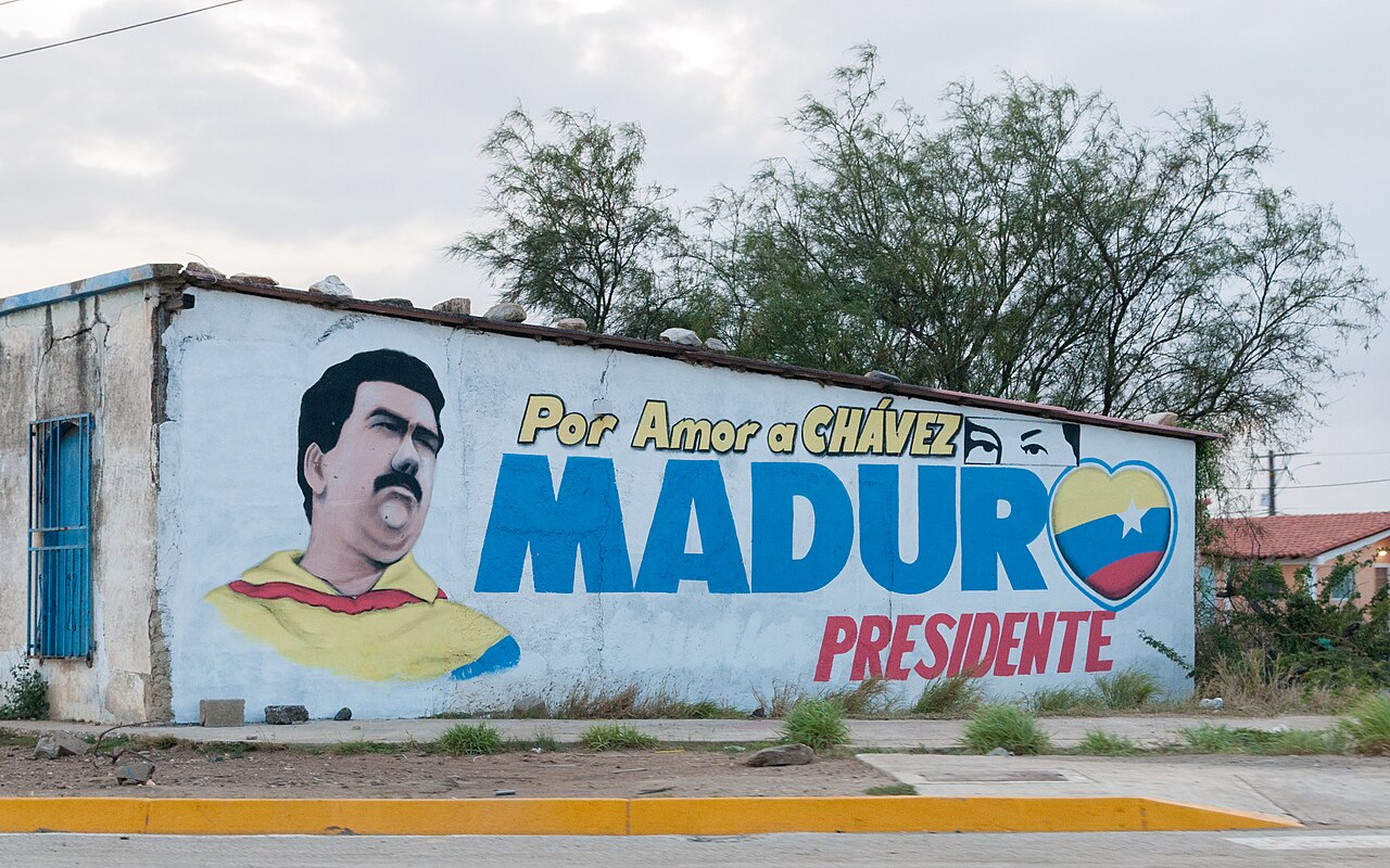 Another oil tanker was seized in an attempt to oust maduro, shown here in an ad on a vsnezuelan building