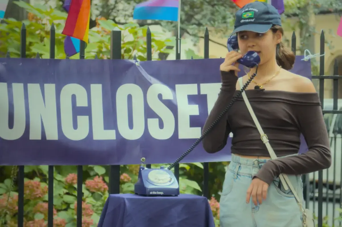 Young girl on a phone receiving a message of hope for lgbtq