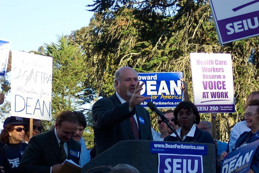 Rob reiner speaking at a rally for presidential candidate howard dean in san francisco