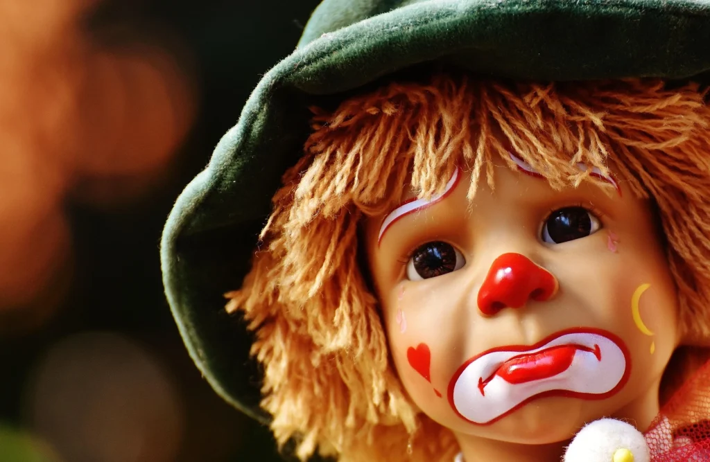 A sad clown doll representing the children in the dilley detention center in texas.