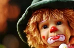 A sad clown doll representing the children in the dilley detention center in texas.
