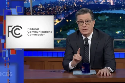 Stephen Colbert with FCC logo
